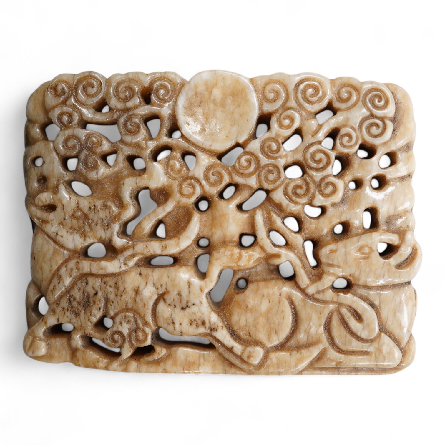 A Chinese russet jade rectangular plaque, 7cm wide